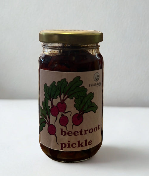 Jar of beetroot pickle with a label on a white background