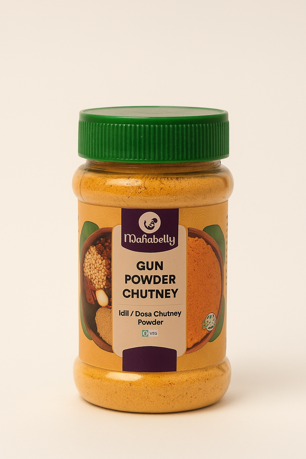 Jar of Mahabelly Idli/Dosa gun powder chutney with a green lid on a beige background 